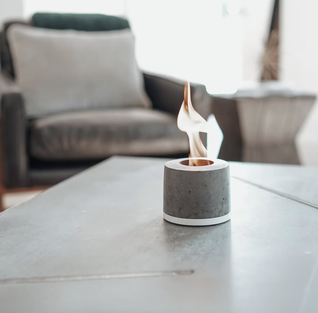 Forget candles this year and instead gift a bonafide flame. This personal mini fireplace ($99) isn't just stylish, it's totally functional, too, and can be used both inside and outdoors. It impressively offers all of the same benefits as a regular-size fireplace in a portable, convenient package. We're talking marshmallow toasting, warmth, light, and setting an irresistibly cozy mood.
