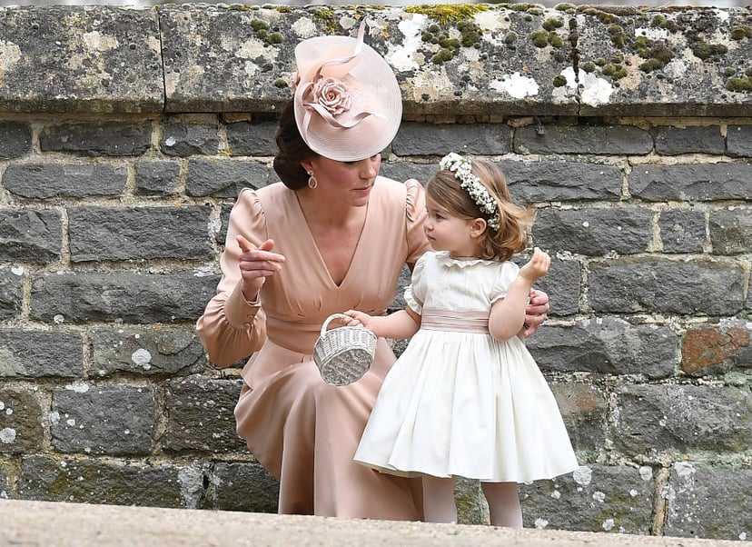 ENGLEFIELD GREEN, ENGLAND - MAY 20:  Catherine, Duchess of Cambridge and Princess Charlotte of Cambridge, bridesmaid leave the wedding of Pippa Middleton and James Matthews at St Mark's Church on May 20, 2017 in Englefield Green, England.  (Photo by Samir