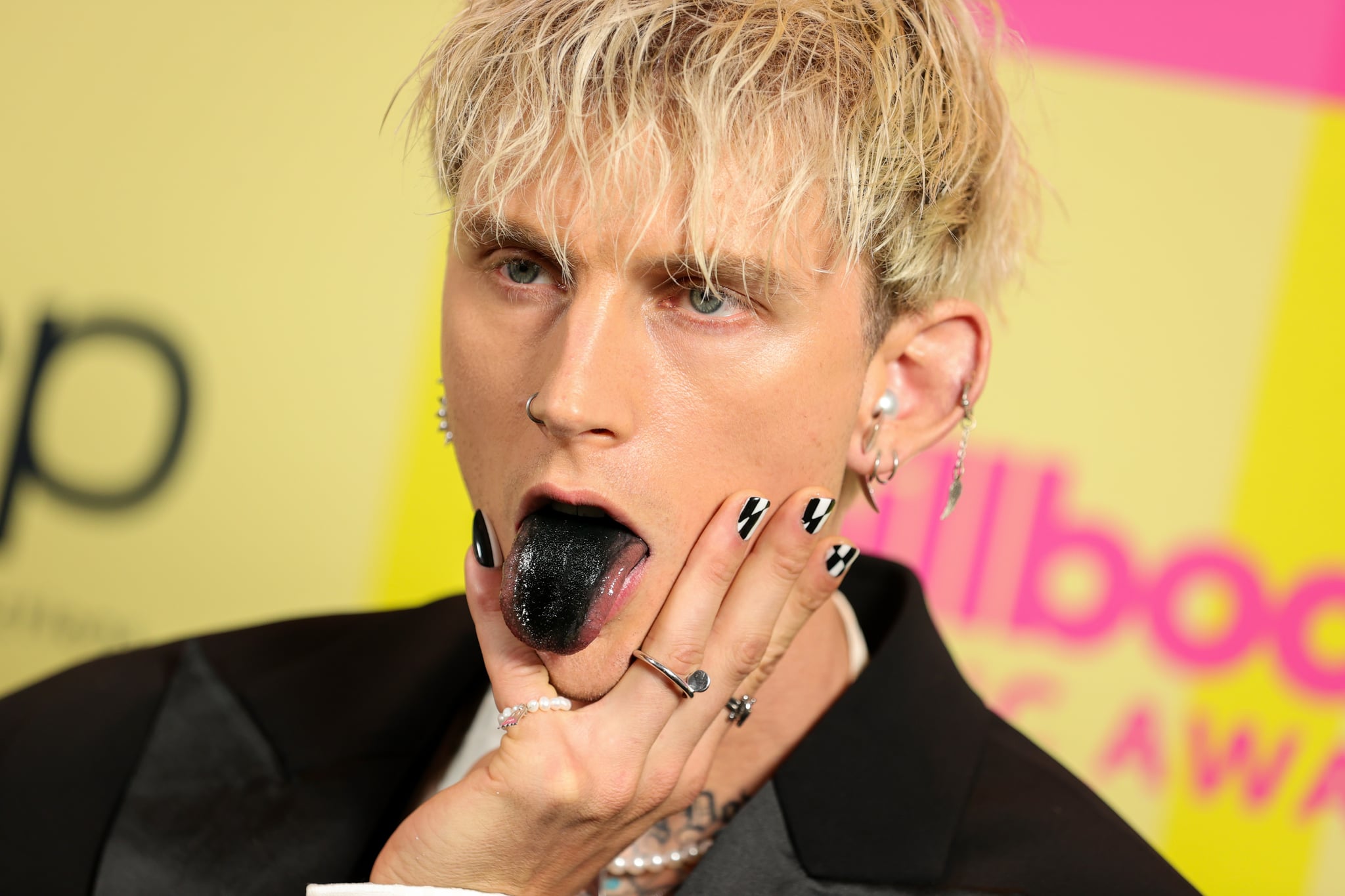 LOS ANGELES, CALIFORNIA - MAY 23: Machine Gun Kelly poses backstage for the 2021 Billboard Music Awards, broadcast on May 23, 2021 at Microsoft Theater in Los Angeles, California. (Photo by Rich Fury/Getty Images for dcp)