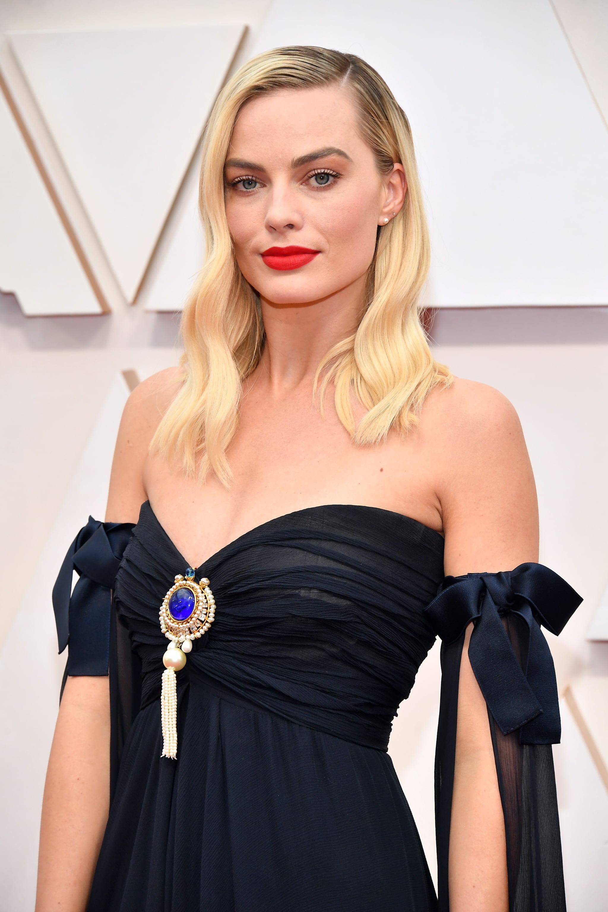 Fashion, Shopping & Style, The Statement Sleeves on Margot Robbie's Oscars  Gown Practically Reach the Red Carpet