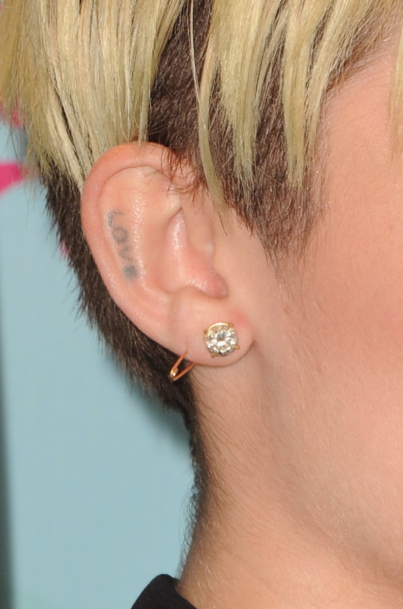 Miley Cyrus's Tattoos: "LOVE" Tattoo