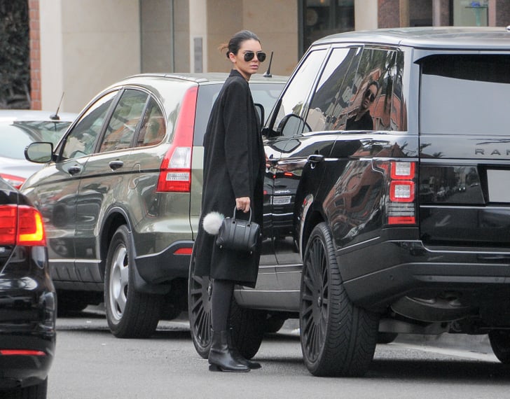 Kendall Jenner adds $3k Fendi keychain to her Valentino handbag