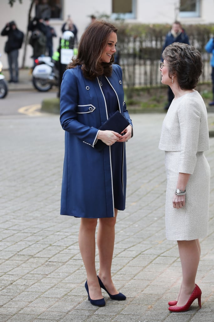 For her visit at the Royal College of Obstetricians and Gynaecologists in London, the Duchess of Cambridge wore a bespoke Jenny Packham coat over a matching dress, which she accessorized with a clutch, Jimmy Choo pumps, and sapphire jewels.