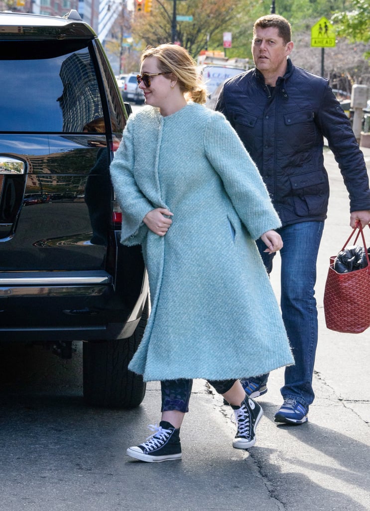 Another trend that Adele mastered was a bright colored Winter coat, which she wore over the weekend with a pair of Converse sneakers.