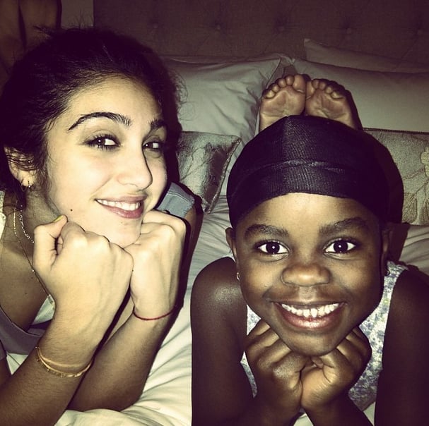Madonna shared a snap of her daughter Lourdes bonding with her younger sister, Mercy.
Source: Instagram user madonna