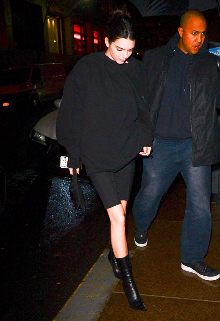 Kendall stepped out in jet black separates, including a pair of pointy-toed leather booties.