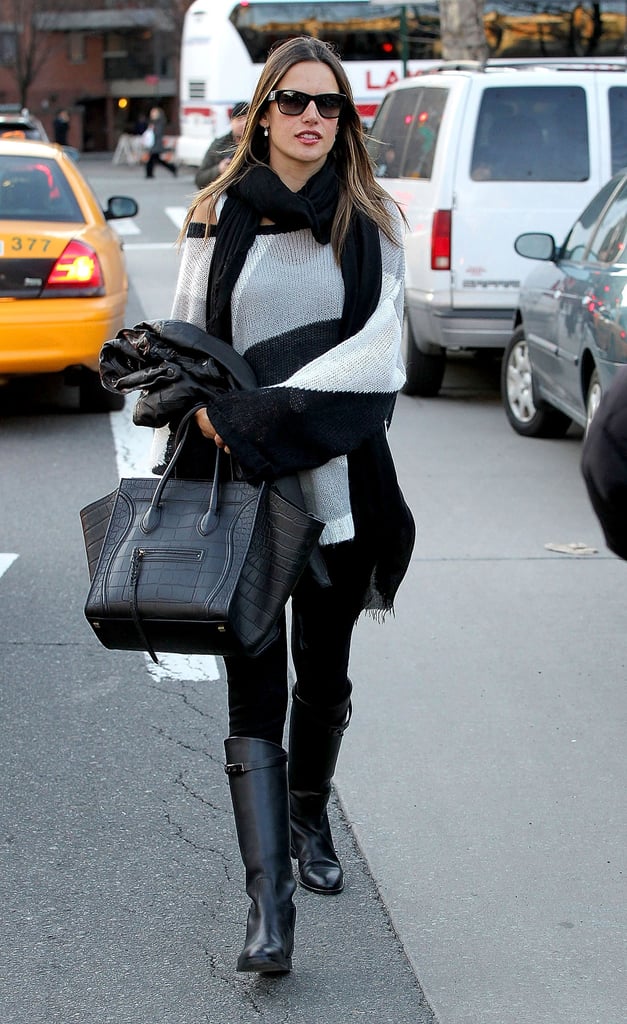 Alessandra Ambrosio styled a black scarf with her colorblock sweater.