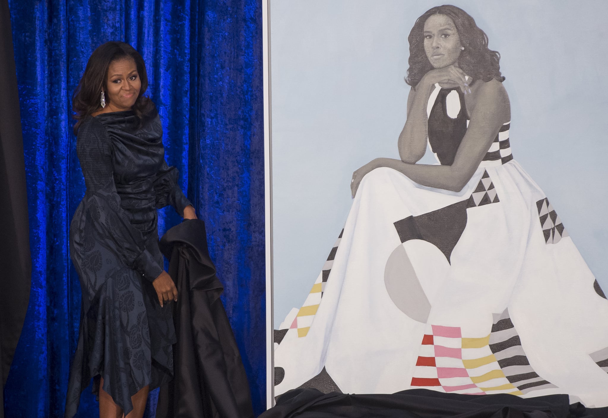 Former US First Lady Michelle Obama unveils her portrait at the Smithsonian's National Portrait Gallery in Washington, DC, February 12, 2018. / AFP PHOTO / SAUL LOEB / RESTRICTED TO EDITORIAL USE - MANDATORY MENTION OF THE ARTIST UPON PUBLICATION - TO ILLUSTRATE THE EVENT AS SPECIFIED IN THE CAPTION        (Photo credit should read SAUL LOEB/AFP/Getty Images)