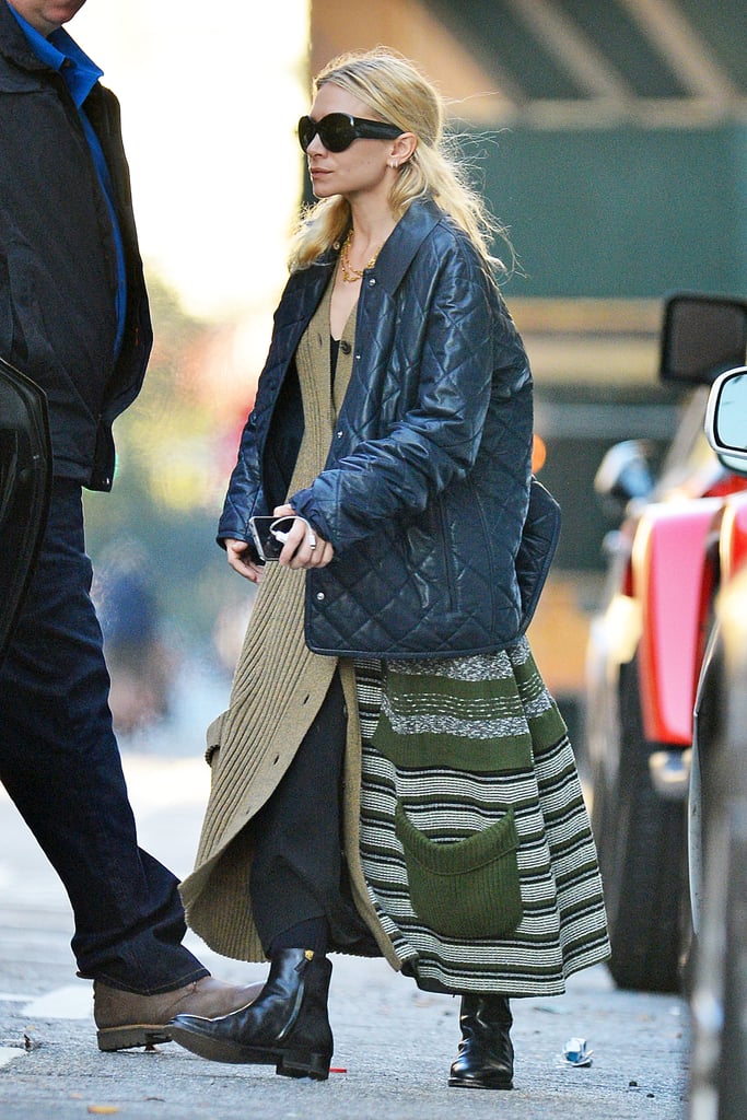 She Styled the Piece Over a Black Layer and Paired It With Booties
