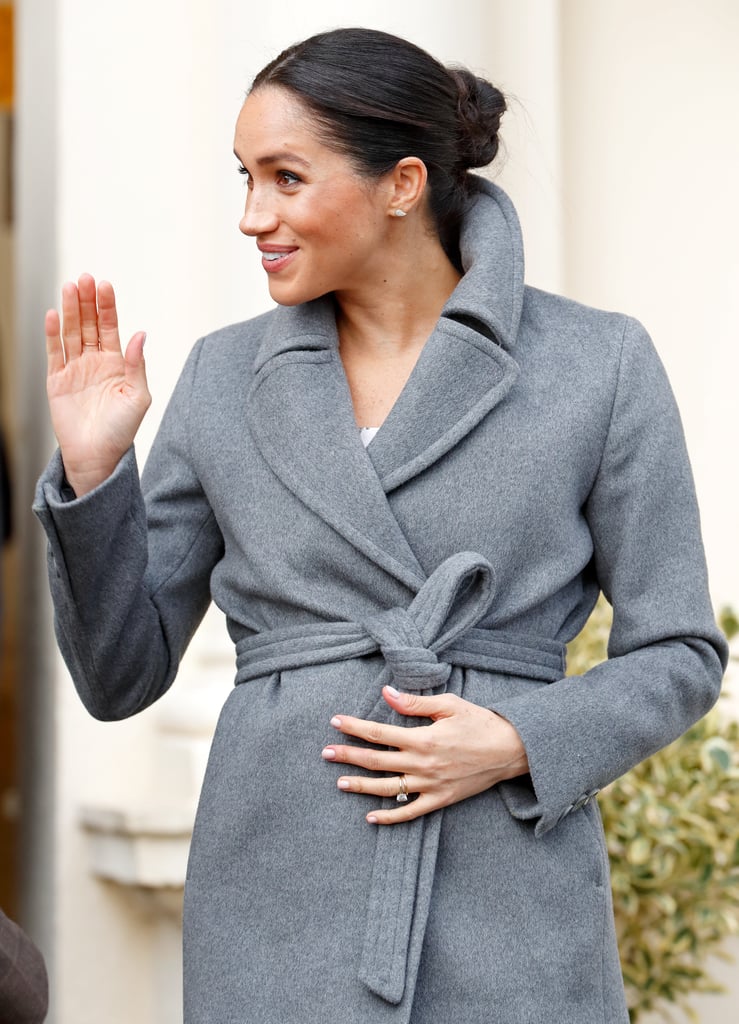 Meghan Markle Touching Baby Bump Pictures