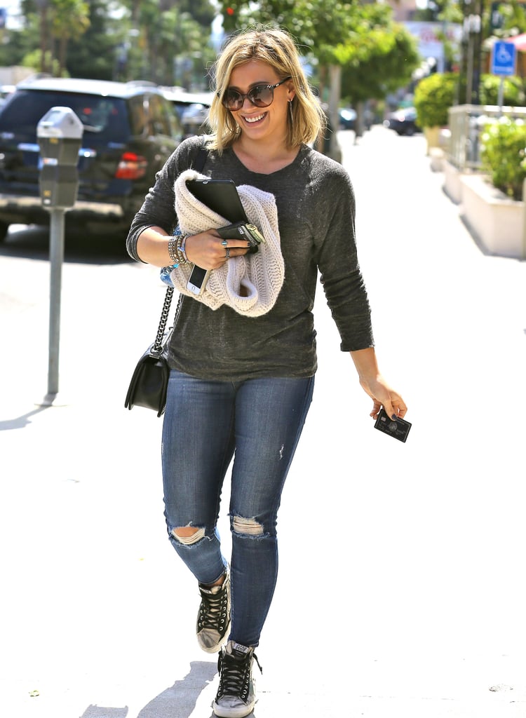 Hilary Duff juggled her things in LA on Thursday.