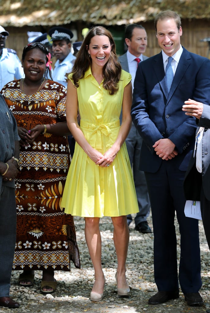 Jaegar in Solomon Islands: In the South Pacific Kate opted for splashes of colour, and wore this buttercup yellow shirt dress with her 'Sledges' and Kiki McDonough citrine drops.