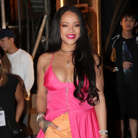 Rihanna Wearing Pink Dress Over Orange Pants in Seoul Korea