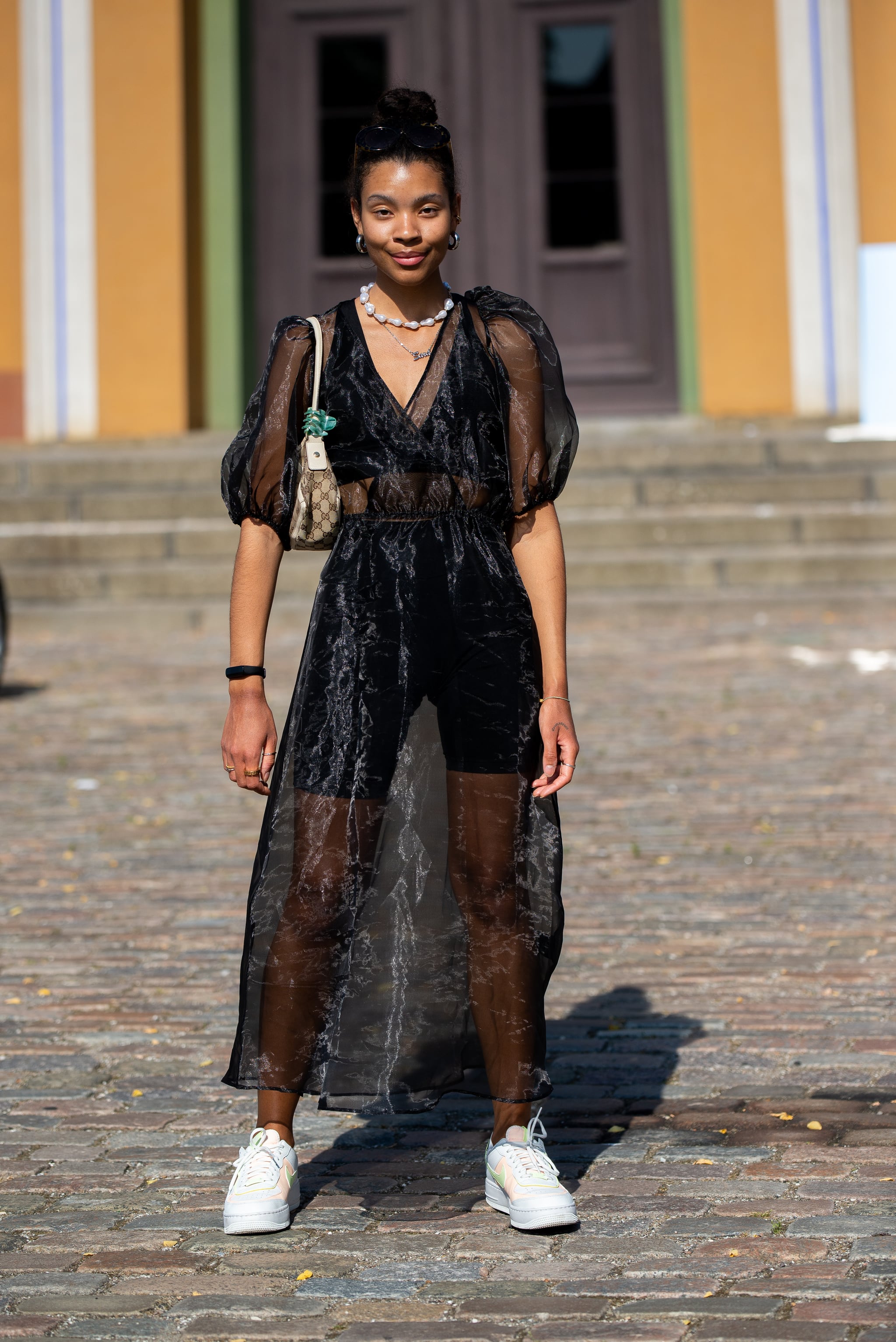 Layer a sheer puff-sleeve dress over a bike set in a matching