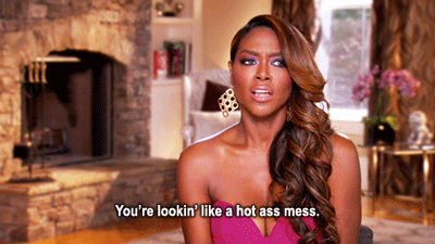 Seeing yourself in the mirror in the bathroom at a late-night party and closely examining your face.