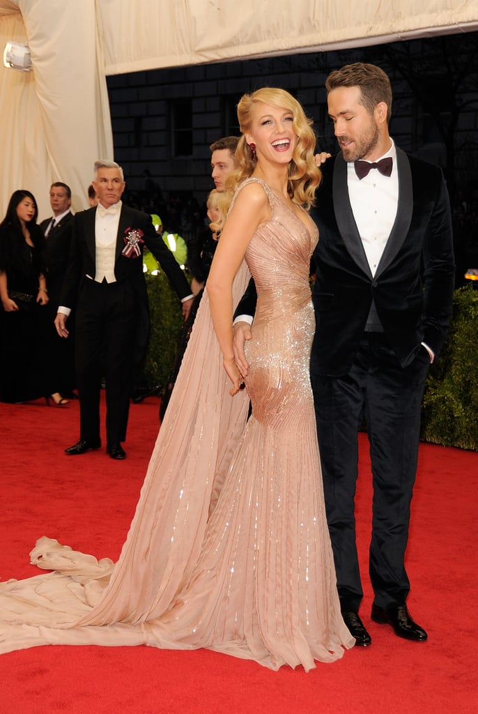 Ryan Reynolds joked with Blake Lively in front of photographer.