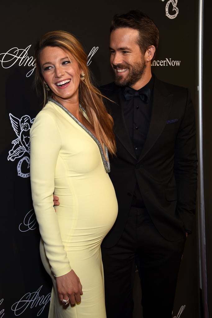 Blake Lively and Ryan Reynolds were the picture of glowing, expecting parents as they made their way into the Angel Ball in NYC on Monday night. Like at her first pregnant red carpet appearance, Blake showed off her bump — this time in a Gucci gown — and she also showed plenty of PDA with Ryan. The couple posed together and gave each other loving glances in front of the cameras for the first time since their May trip to Cannes. Blake wasn't the only lady with a bump at the annual event, which benefits Gabrielle's Angel Foundation for cancer research, since Alicia Keys was on hand as well. She and her husband, Swizz Beatz, are waiting for the arrival of their second child together. There are even more pregnant stars in Hollywood, since Stanley Tucci and his wife, Felicity Blunt, are also going to be parents next Spring. 
The gala also brought out Paris and Nicky Hilton; Kris Jenner, who spent her weekend at a pumpkin patch with Kim and Kourtney Kardashian and their kids; and Bethenny Frankel, who recently announced her plans to return to Real Housewives of New York.