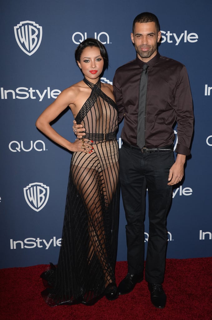Kat Graham and fiancé Cottrell Guidry stayed close on the red carpet.