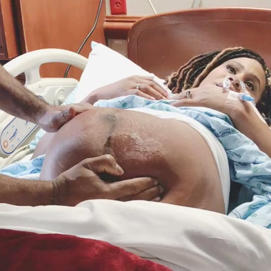 Doctor Performing External Cephalic Version on Breech Baby