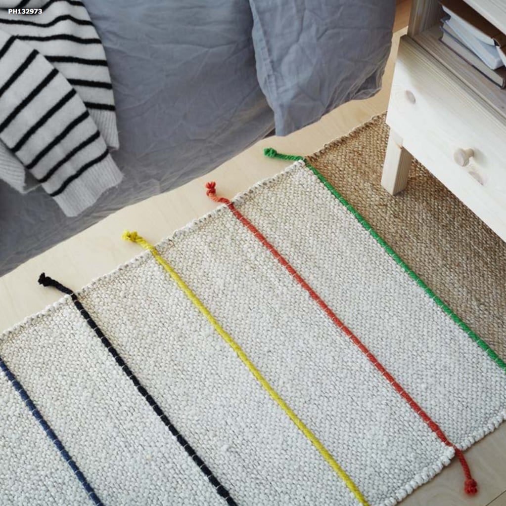 Made from handwoven jute, this durable rug ($30) offers a refreshing pop of color.