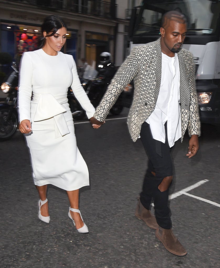 Kim Kardashian and Kanye West held hands during a Tuesday outing in London.