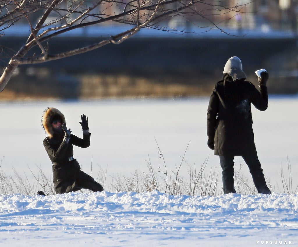 Gisele and Tom had a snowball fight during their stroll in Boston.