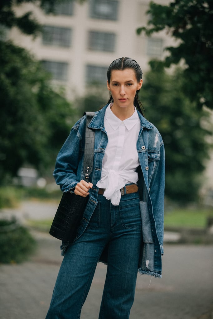 Give denim-on-denim a workwear spin with a crisp white button-down and a smart bag.