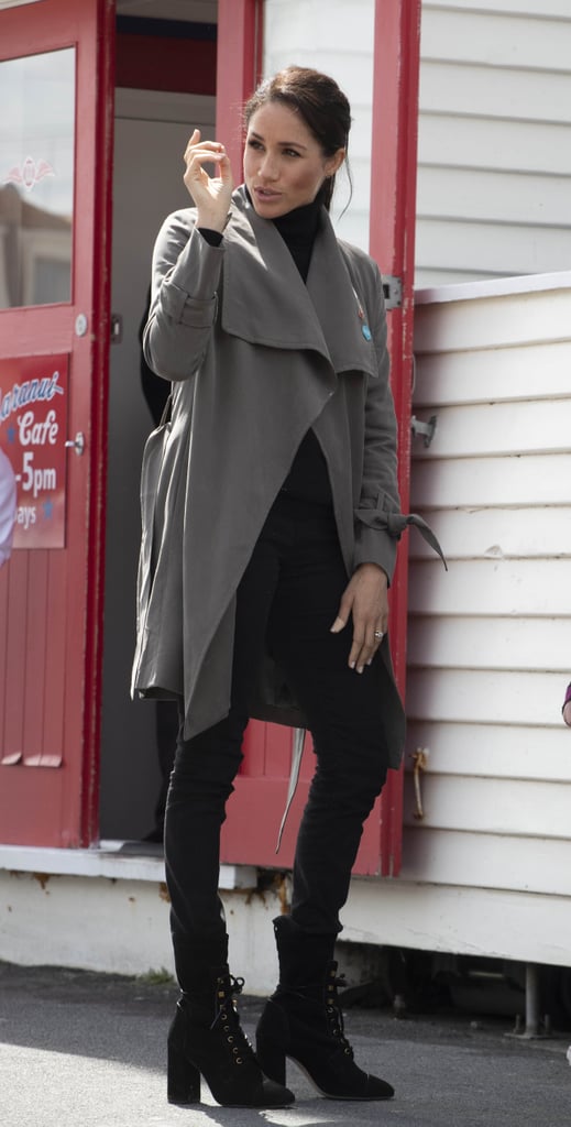 Meghan Wore a Club Monaco Coat and Stuart Weitzman Boots For a Visit in New Zealand