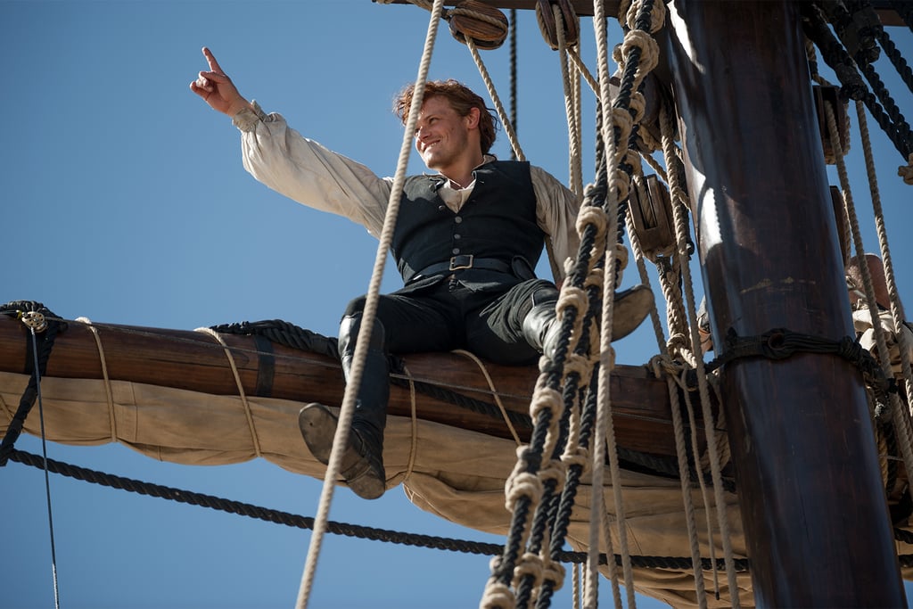 Sam Heughan rocking out while filming a season three scene at sea.