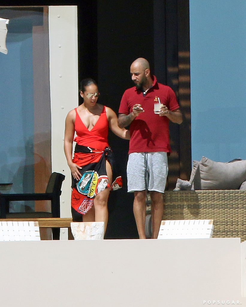Alicia Keys Wearing a Red Swimsuit