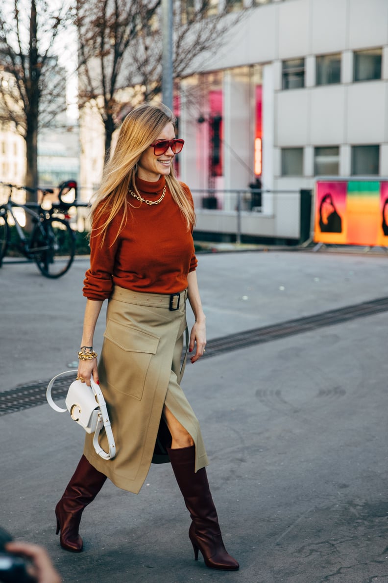 Wear Chocolate Knee-High Boots With a Khaki Asymmetrical Skirt