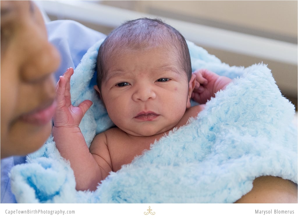 Birth Photos and Sibling Meeting Baby