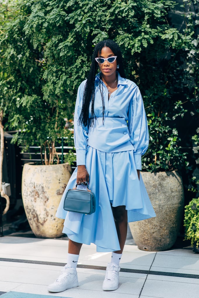 We love the look of a tailored shirt dress and sneakers. We love the look of a tailored shirt dress and sneakers.