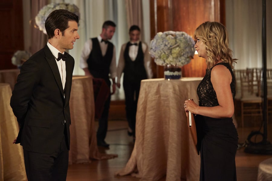 Ben and Leslie are all dressed up for some sort of party.