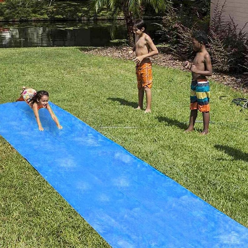 Setting Up a Slip N' Slide in Your Parents' Backyard