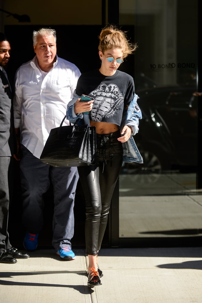 Gigi Leaves Her Apartment in a Comfy Crop Top and Black Skinny Pants