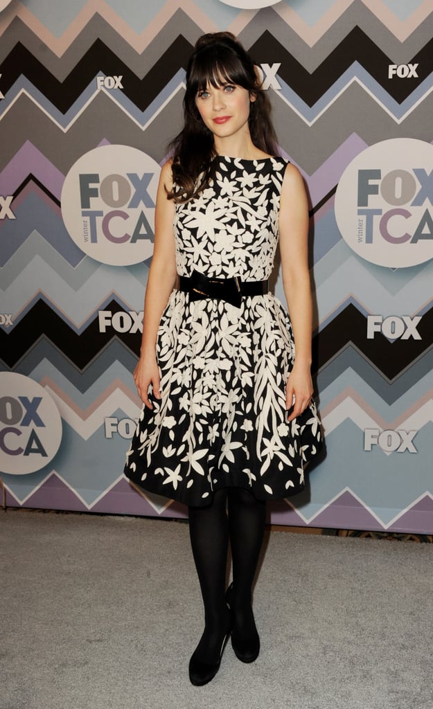For Fox's All-Star Party, Zooey chose a black-and-white printed Naeem Khan number, which she then paired with a sweet bow-tie belt, black tights, and black pumps.