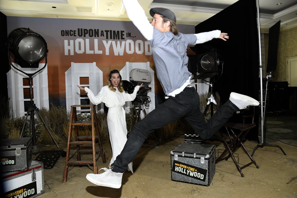 Brad Pitt Photobombing Margot Robbie and Leonardo DiCaprio