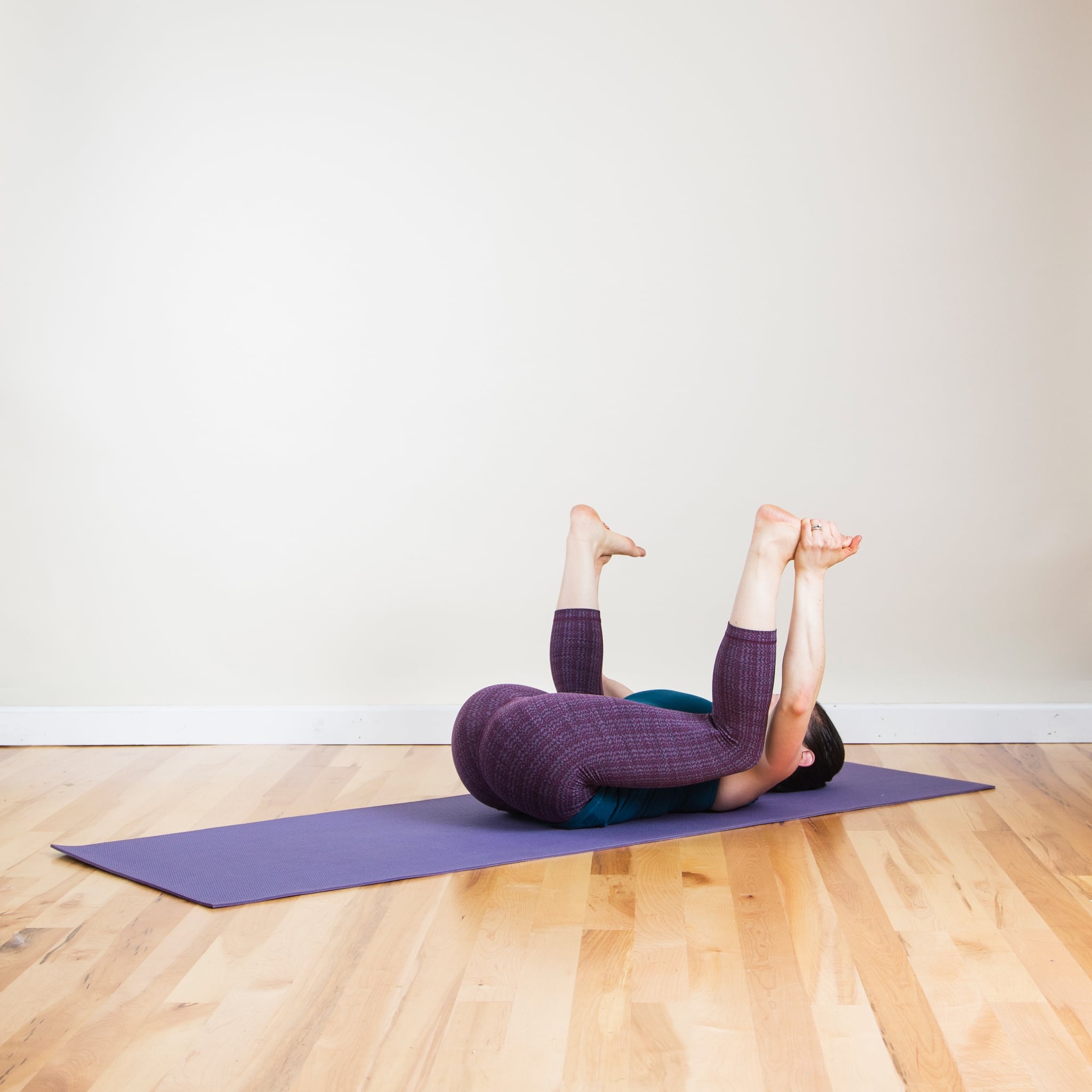 How to Do Happy Baby (Ananda Balasana) in Yoga and Pilates