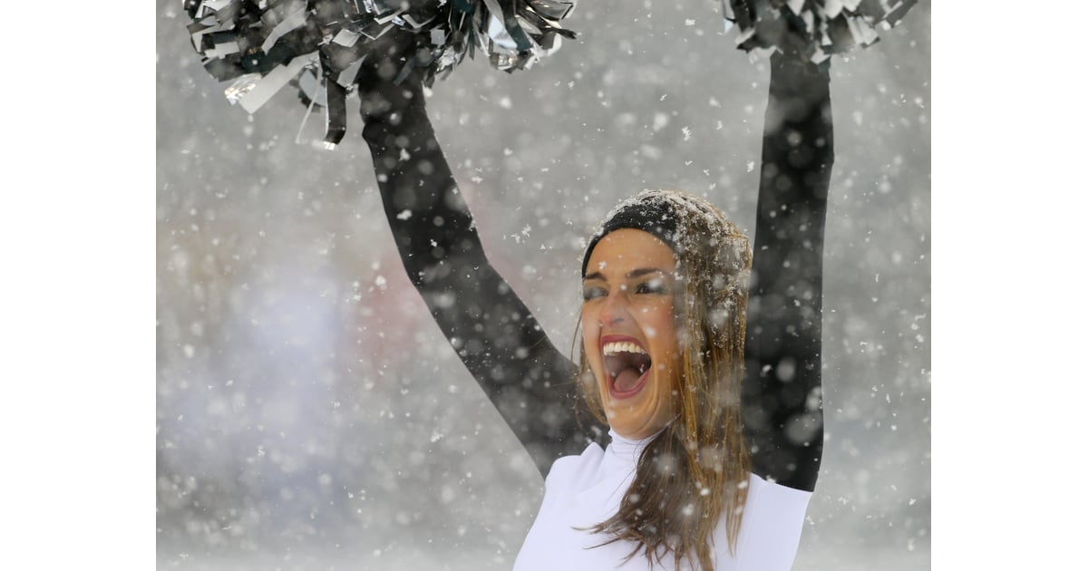 A Philadelphia Eagles cheerleader braved the snowy weather during the
