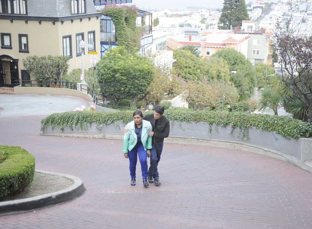 Mindy looks less than thrilled when the pair walks on Lombard Street.