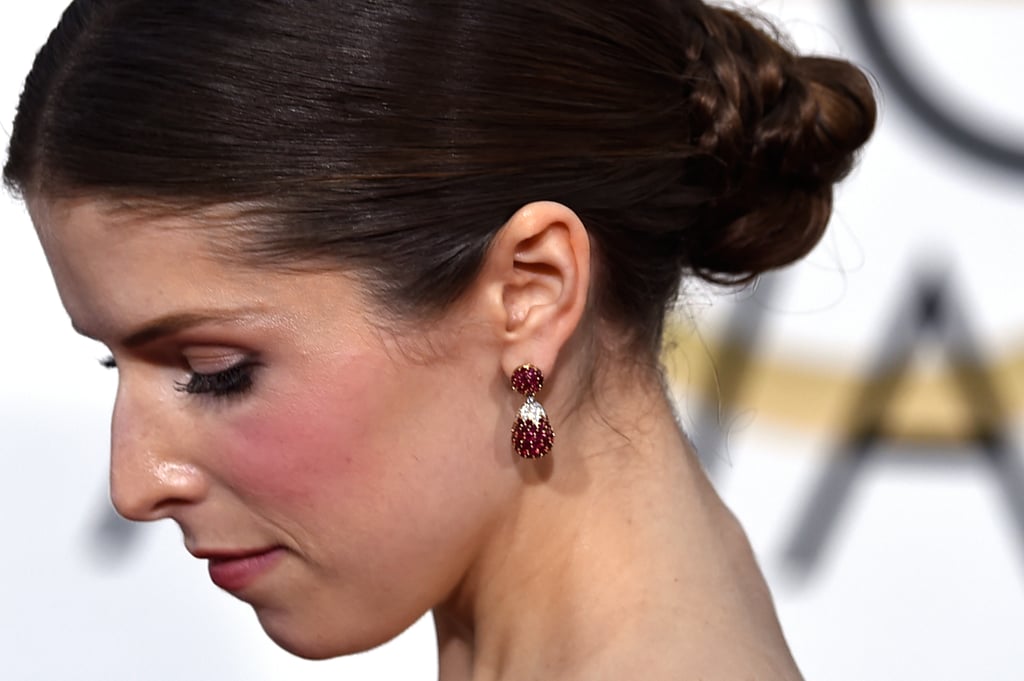 Anna Kendrick completed her fairy-tale look with 1960s ruby and diamond pendant earrings from Neil Lane.