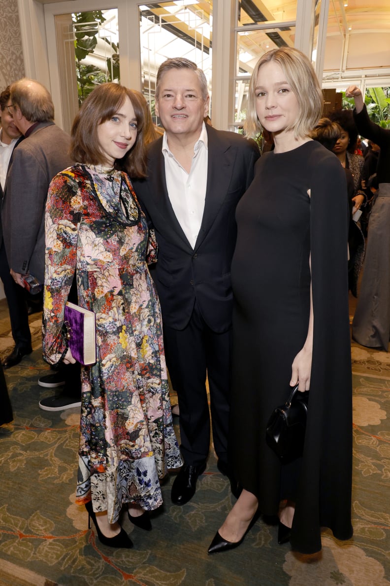 LOS ANGELES, CALIFORNIA - JANUARY 13: (L-R) Zoe Kazan, Netflix Co-CEO and Chief Content Officer Ted Sarandos and Carey Mulligan attend the AFI Awards Luncheon at Four Seasons Hotel Los Angeles at Beverly Hills on January 13, 2023 in Los Angeles, Californi
