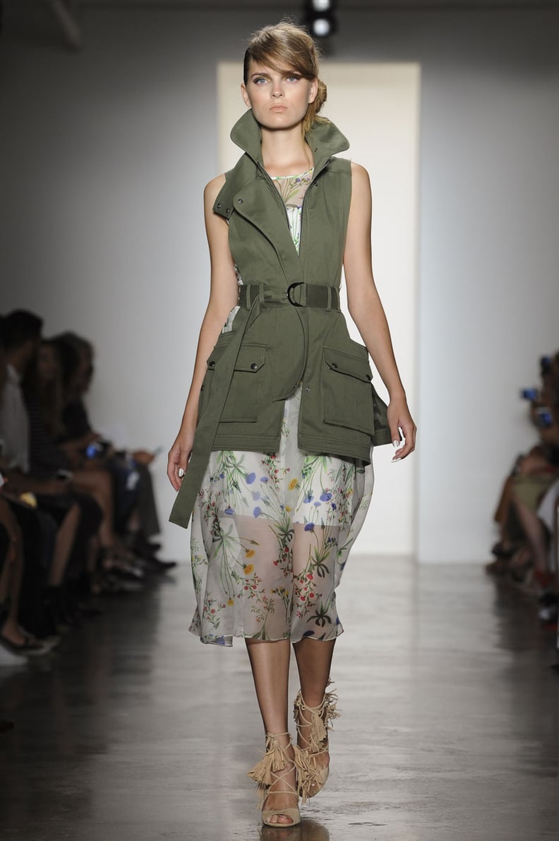 An army vest to toughen up a floral dress.