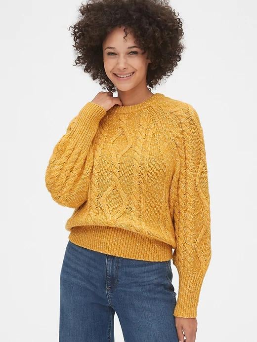 If she's not afraid to go bold with her color palette, this mustard yellow Marbled Cable-Knit Crewneck Sweater ($80) will be a great addition to her wardrobe.