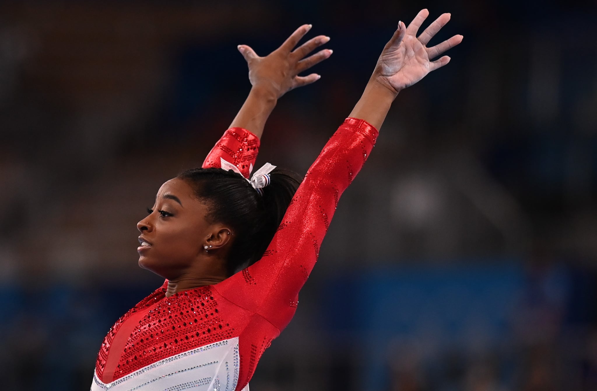 Simone Biles of the United States competes in the vault of the artistic gymnastics women's team final at the Tokyo 2020 Olympic Games in Tokyo, Japan, July 27, 2021. (Photo by Cheng Min/Xinhua via Getty Images)