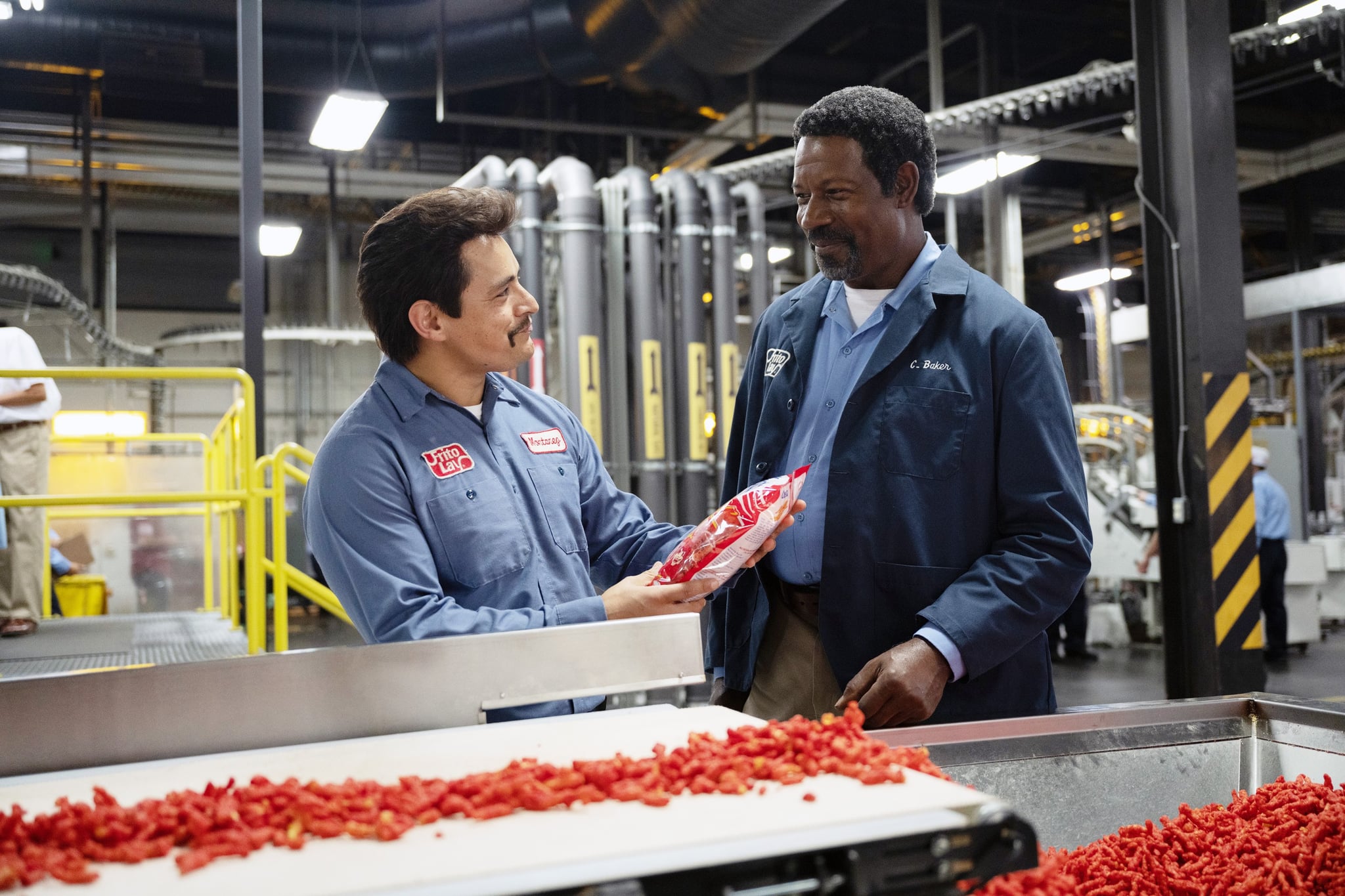 FLAMIN' HOT, from left: Jesse Garcia Dennis Haysbert, 2023. ph: Anna Kooris / Searchlight Pictures / Courtesy Everett Collection