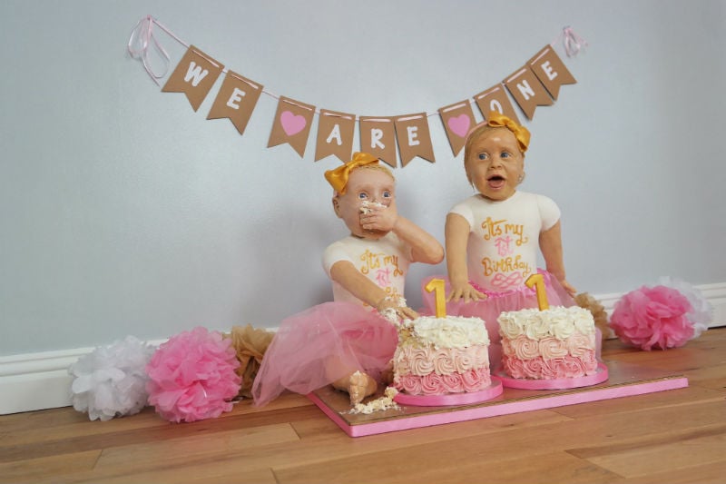 Cake versions of Lily and Lyla with their own cakes.