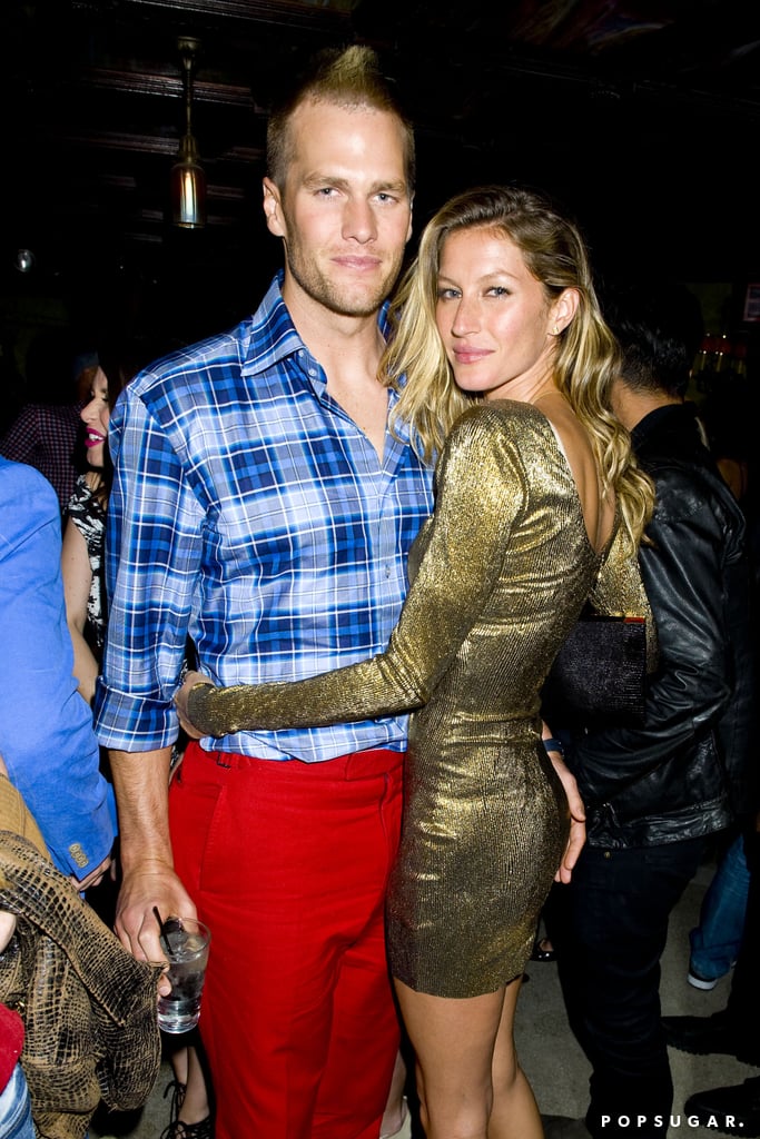 Gisele hugged Tom, who was dressed in an interesting outfit.
