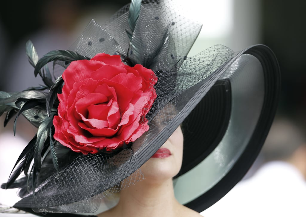 A woman went dramatic with her black and red hat in 2012.